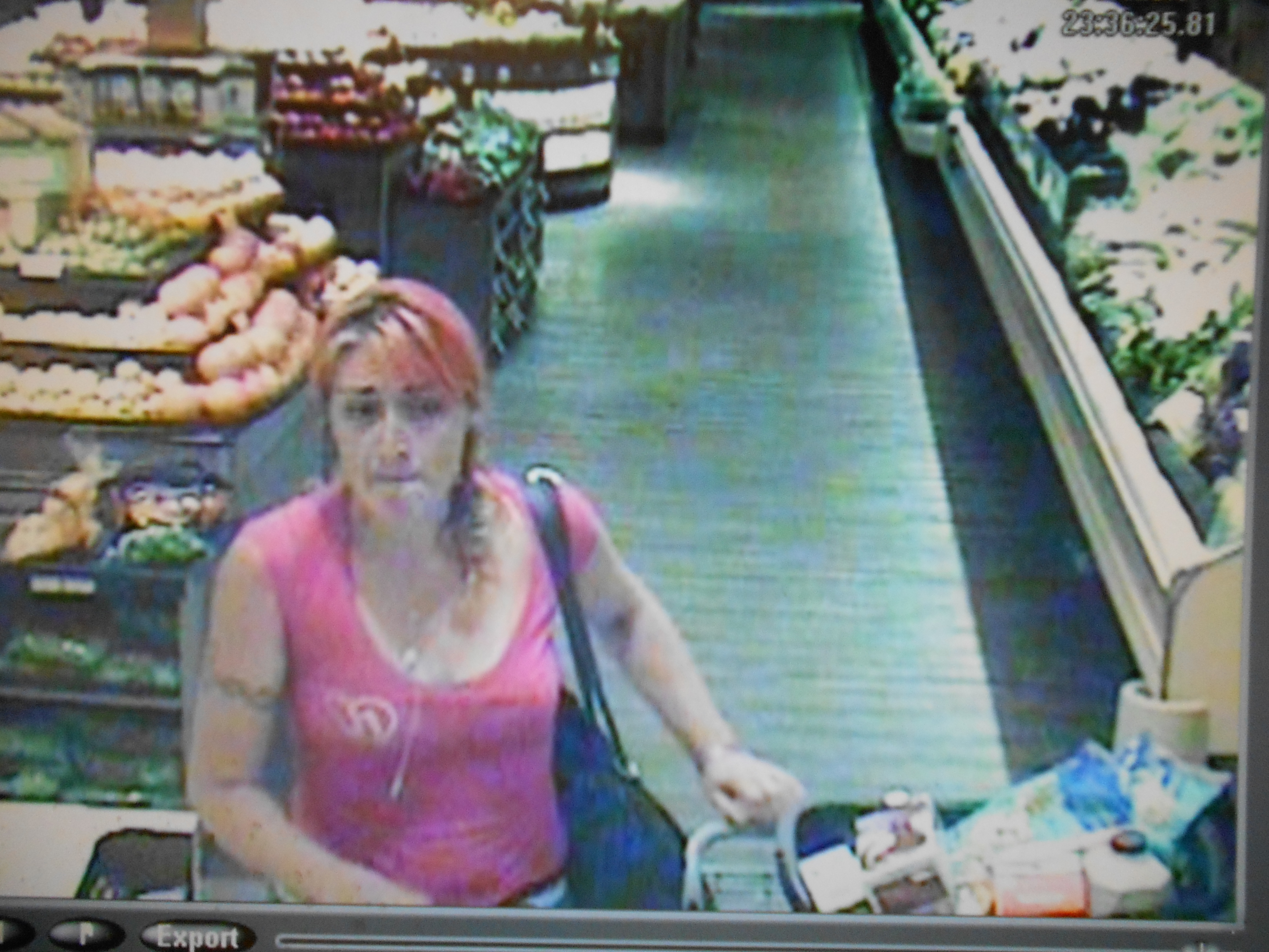 Heavy set Caucasian female with pink dyed hair